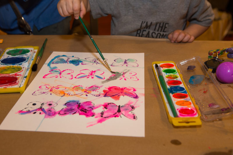 Child’s hands watercolor painting