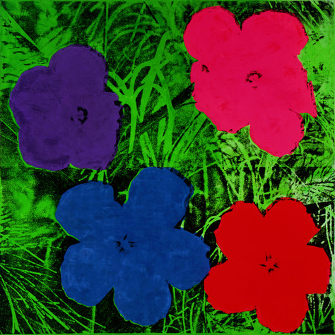 Four simple, five-petaled flowers are printed against a vibrant green background of grass. The flowers on the left side of the image are purple on the top and blue on the bottom, and on the right they are hot pink on the top and red on the bottom.
