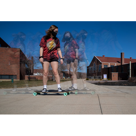 Double exposure photo of a girl on a skateboard